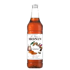 Monin Caramel Syrup bottle with clear color that shows off the brown colored caramel syrup from Saudi Supplier.